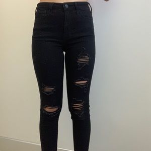 black ripped hollister jeans: size 0R 24W
